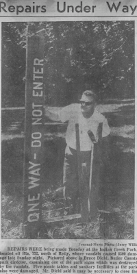 Bruce Diehl The first MetroParks director helps to repair vandalism at Indian Creek