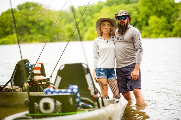 Man and woman fishing in the Great Miami River