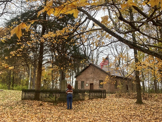 Pioneer Church and cemetery at Indian Creek MetroPark in fall
