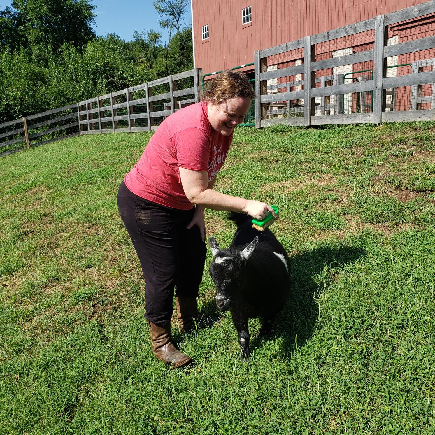 Farm Caretaker with goat Farm Caretaker with goat